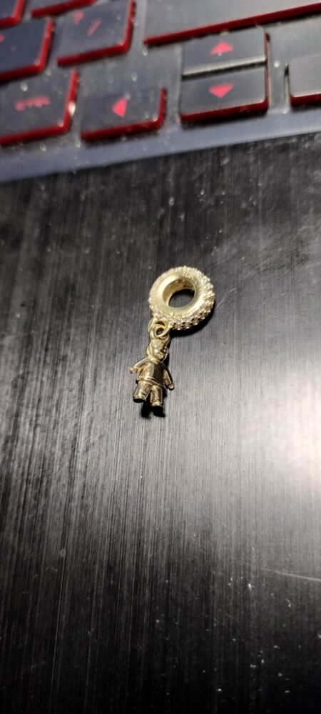 charms rddo c/niño zirc 10k zirc B Weight 1.55gr