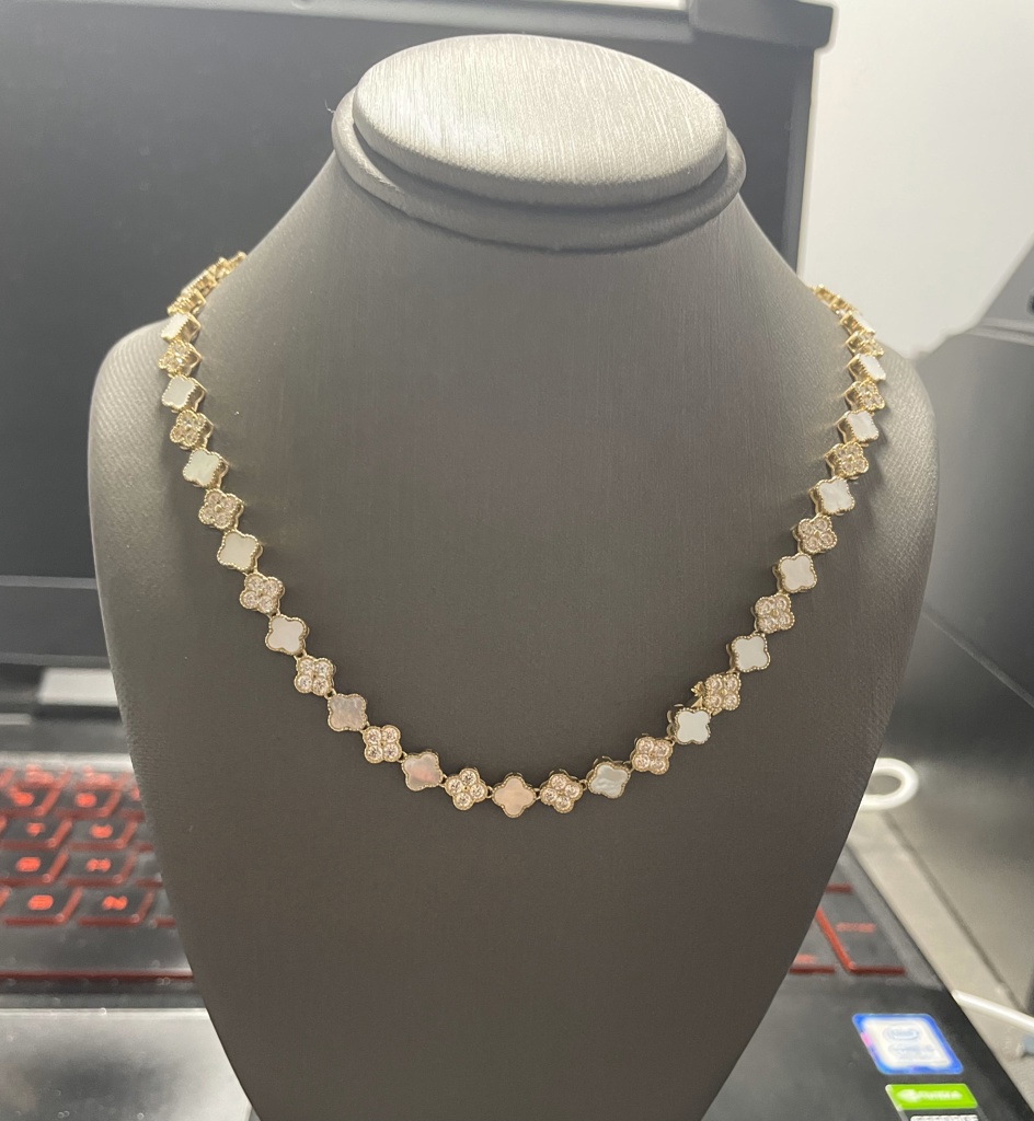 Gargantilla clover flore B y zirc 10k onyx /zirc Size size18/6mm Weight 15.35gr