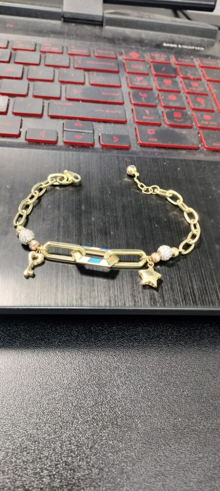 manilla ppclip c/charms llavfeestrella bolas 14k zirc B Size size7-7.5 Weight 6.7gr