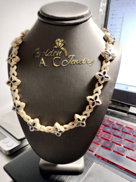 Gargantilla xoxo c/flores Azules y zirc 14k zirc BAz Size sz22.5/15.5mm Weight 67.4gr