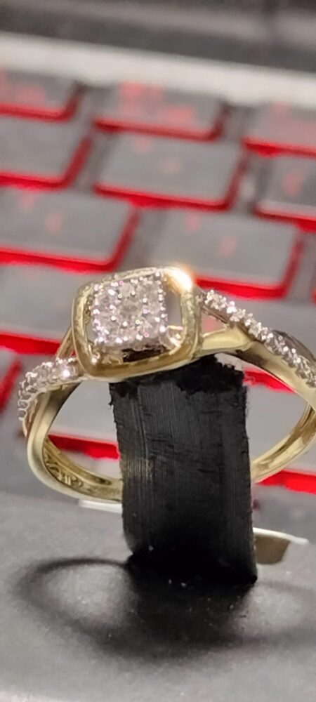 anillo Diam cddo 2 niveles lat.cruzado c/diam. 10k diamante Size size 7 Weight 0.14ctw