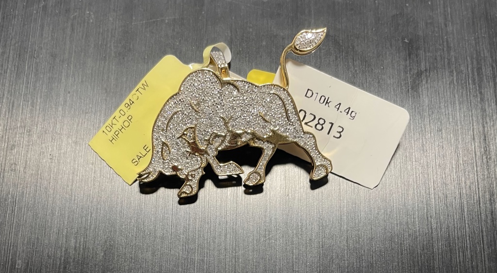 dije Diam. bufalo 10k diamante Weight 4.4gr/0.94ctw