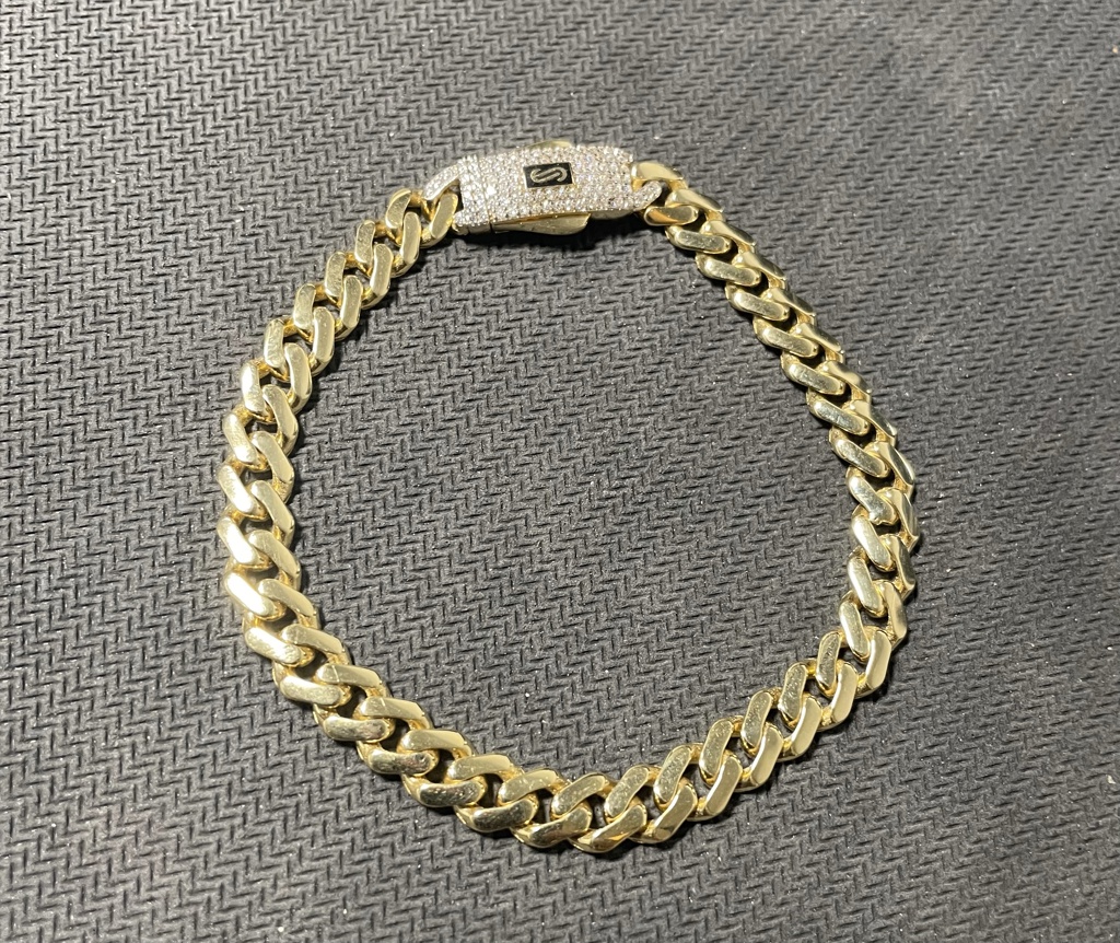 manilla monaco c/zirc S 14k zirc B Size size7/5mm Weight 5.7gr