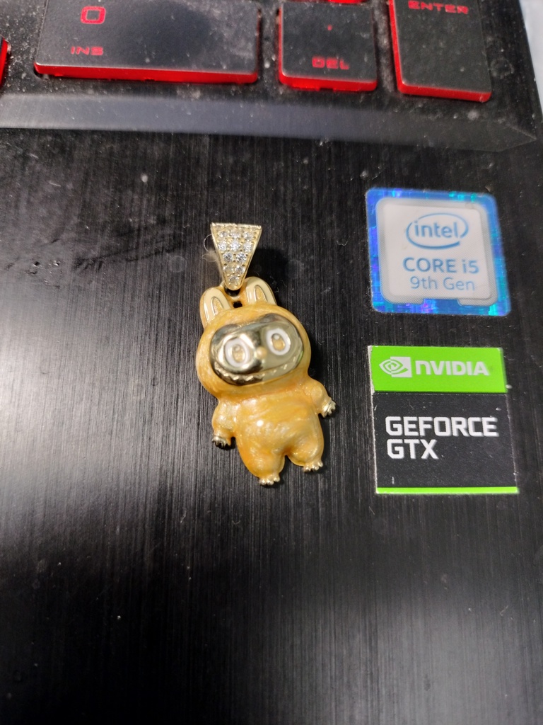 dije 10k zirc B ename amarillo Weight 2.3gr