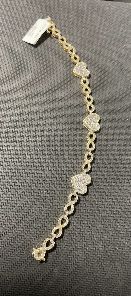 manilla Diam. inf. y corazones 10k diamante Size size7/11.7mm Weight 2.65ctw