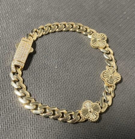 manilla monaco bclip flor oro 3c/zirc. 14k zirconia Size size7.5/7mm Weight 14.9gr