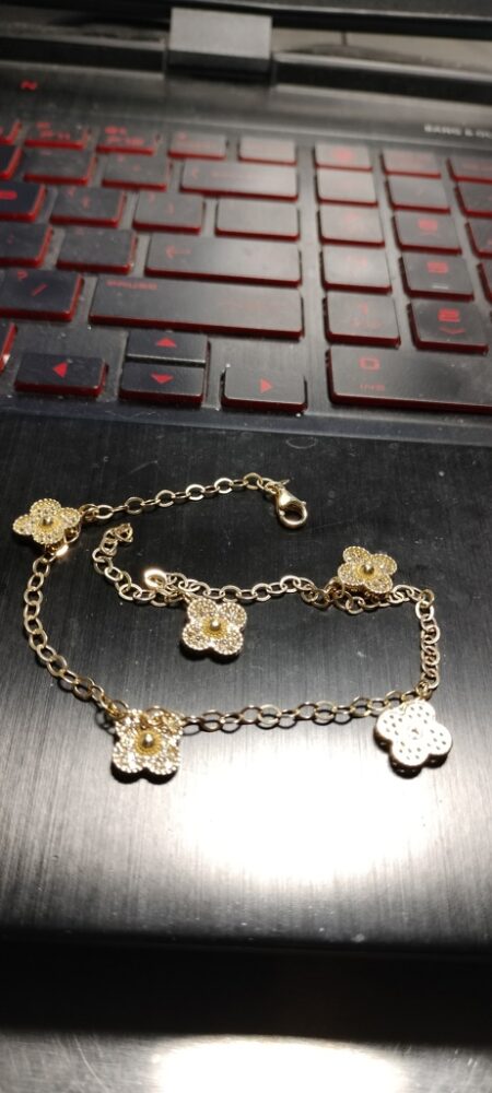 tobillera clover 5 flores oro c/zirc 10k zirc B Size size10/10mm Weight 5.1gr