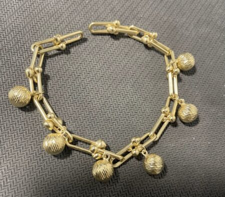 manilla tiffany c/bolas charms 10k Size size7.5/7.8mm Weight 7.9gr