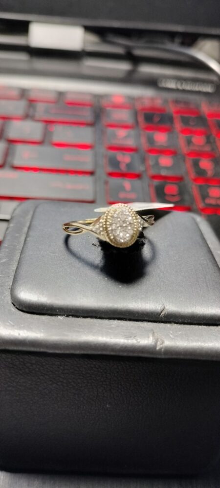 anillo Diam rddo 3 niveles lat. cruzado c/diam. 10k diamante Size size7 Weight 0.10ctw