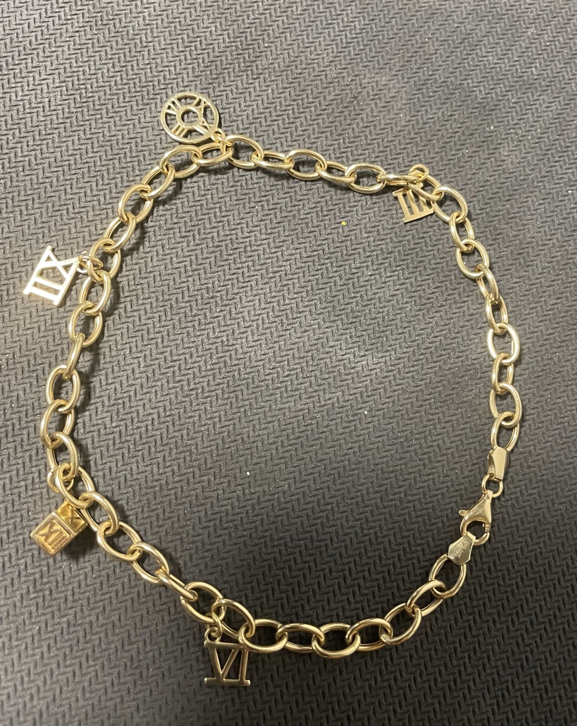 tobillera c/charms 14k Size size10/5mm Weight 7.3gr