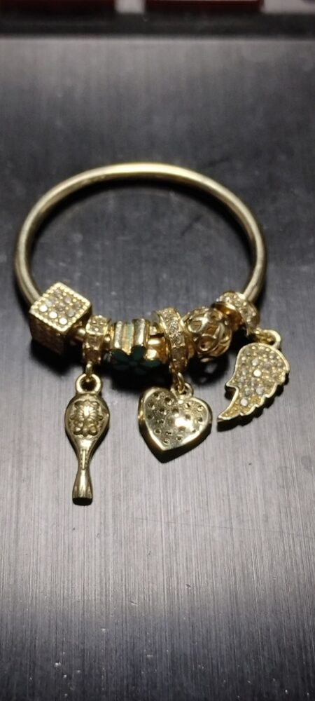 charms con 6 charms dado ,ala, coraz.,.... 14k zirc B Size R26.4mm Weight 4.3gr
