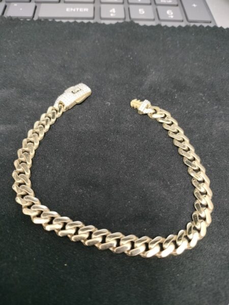 manilla monaco c/zirc S 14k zirc S Size size7/6.2mm Weight 7.gr