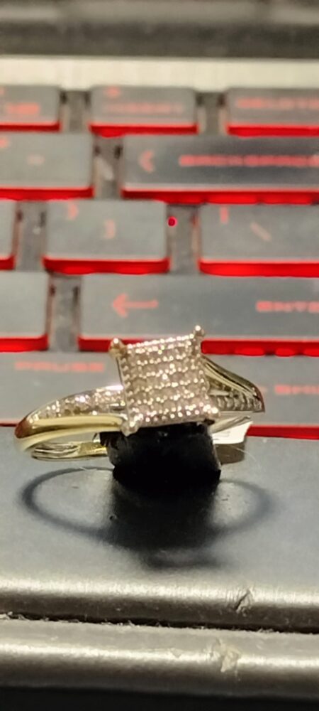 anillo Diam cddo late cruzado c/diam. 10k diamante Size size 7 Weight 0.10ctw