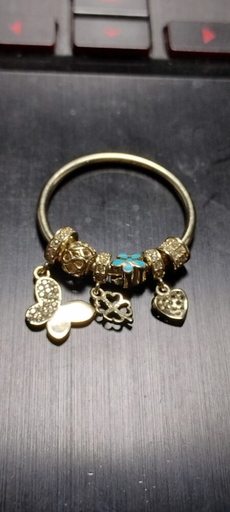 charms con 6 charms mariposa ,coraz,.... 14k zirc B Size R25.75mm Weight 4.gr