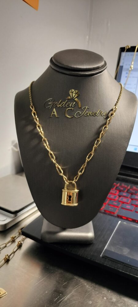 Gargantilla c/candado c/charms 14k zirc B Size size18 Weight 7.65gr