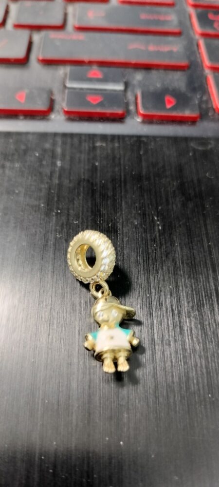 charms niño c/gorra zirc enam 14k zirc B ename BV Weight 2.4gr