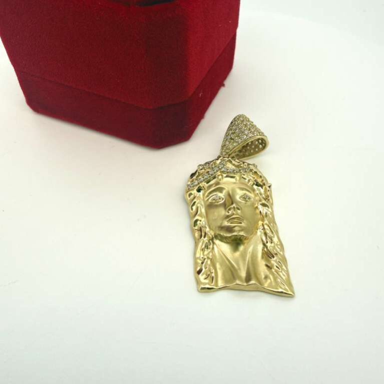 Earring christ face 10k zirc B Weight 3.95gr