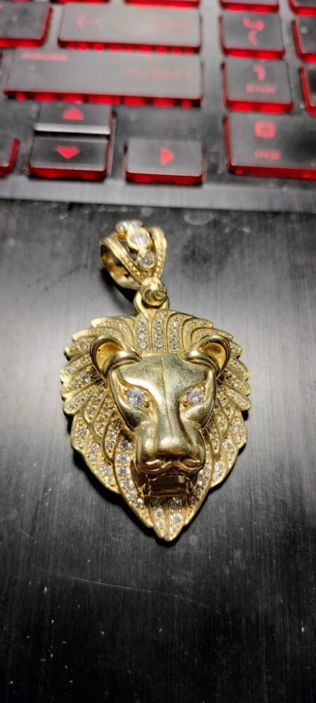 dije cara leon c/zirc 10k zirc B Weight 11.55gr