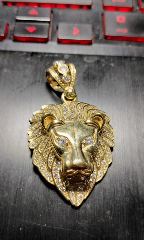 dije cara leon c/zirc 10k zirc B Weight 11.55gr