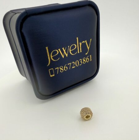 charms barrel 10k zirc W 0.9gr