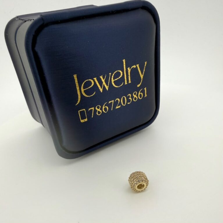 charms barrel 10k zirc W 0.9gr