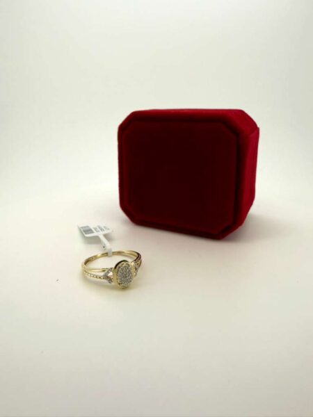 Ring + Diamond ladiesring oval 10k Size 7/0.08ctw Weight 1.5gr