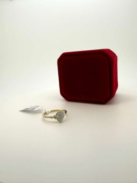 Ring + Diamond ladiesring drop 10k Size 7 Weight 0.11ctw