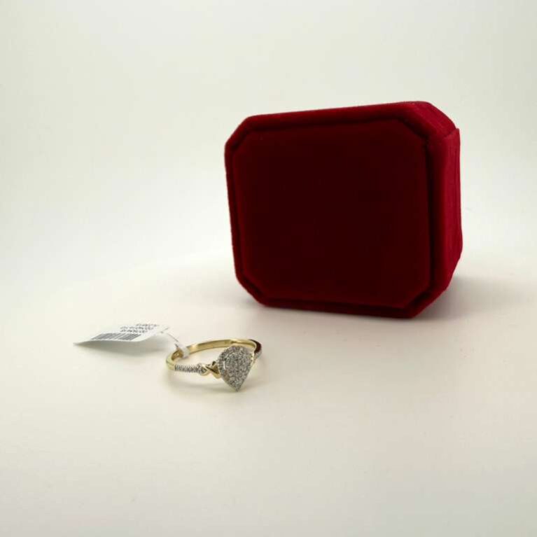 Ring + Diamond ladiesring drop 10k Size 7 Weight 0.11ctw